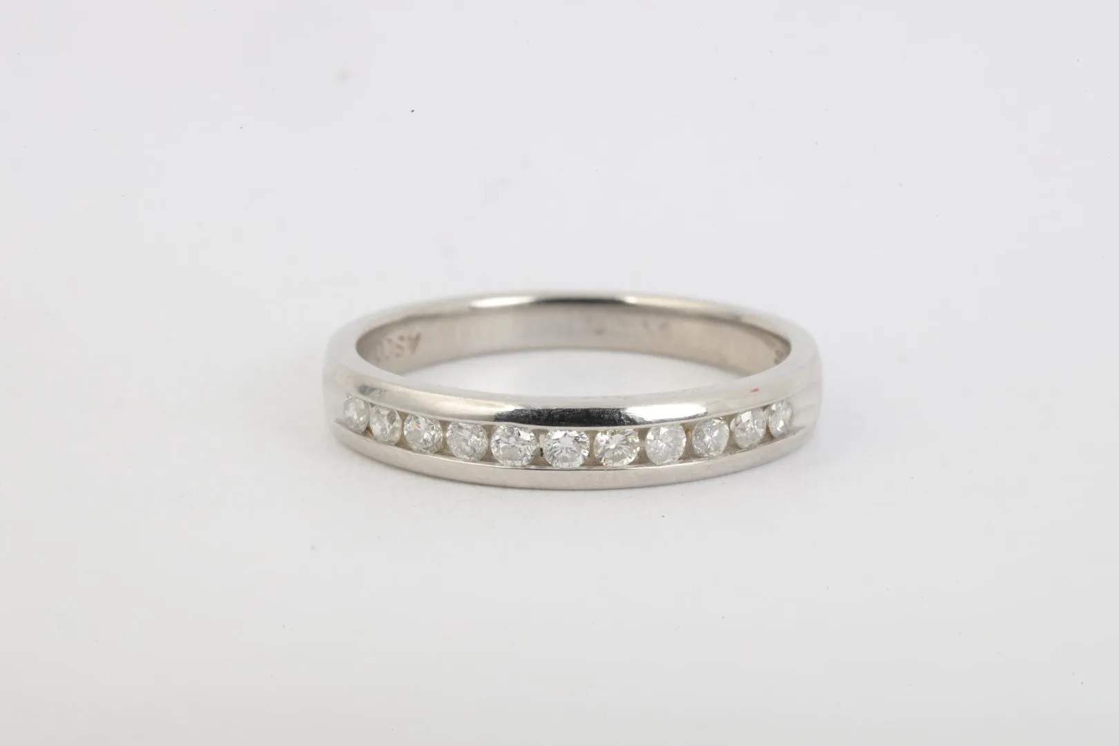 950 Platinum Ring Band with 0.50tcw Diamonds Size 7.25 (4.63g.)