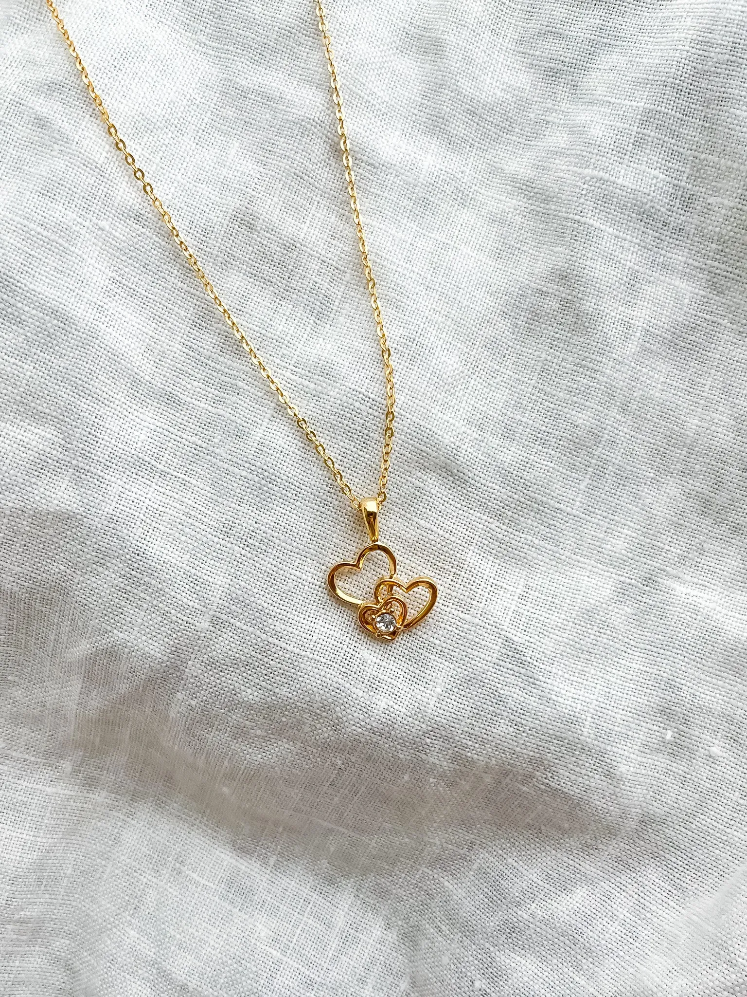 Adorable NOS 1980's Gold and Diamond Rhinestone Heart Trio Charm Necklace